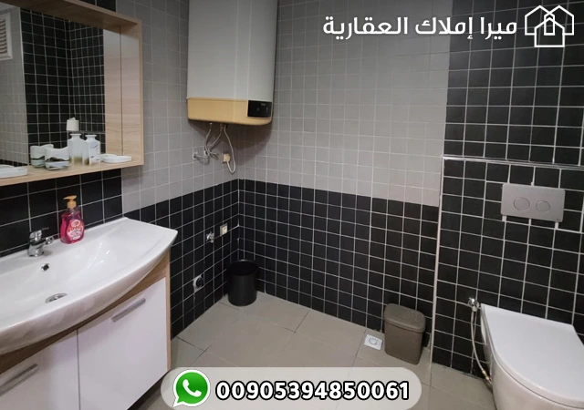 شقة مؤثثة ومكيفة غرفتين وصالة للبيع في طرابزون أرسين في مجمع سكني هادئ وآمن