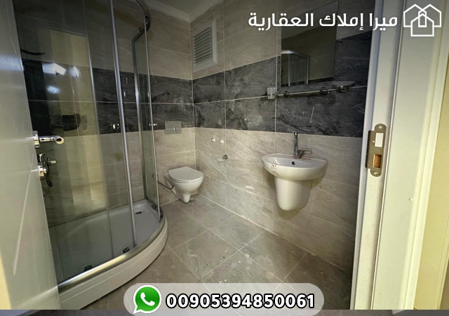 شقة 3 غرف وصالة للبيع في طرابزون يومرا بسعر مميز جدا ضمن مجمع سكني كامل الخدمات