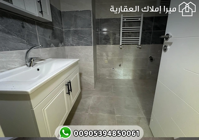 شقة 3 غرف وصالة للبيع في طرابزون يومرا بسعر مميز جدا ضمن مجمع سكني كامل الخدمات